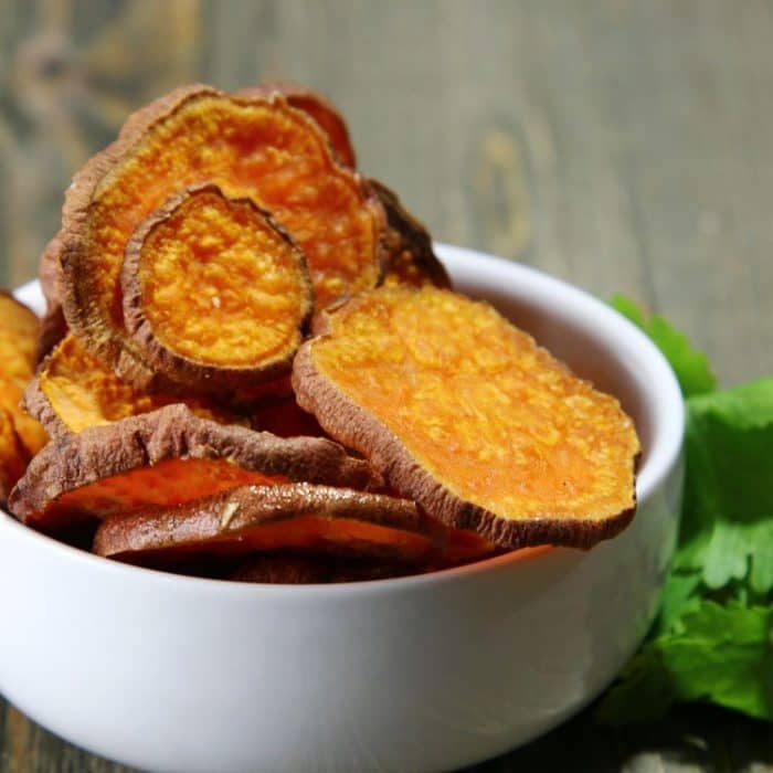 Make these healthy baked sweet potato chips in the oven or your excalibur dehydrator. Best sweet potato chips recipe ever.