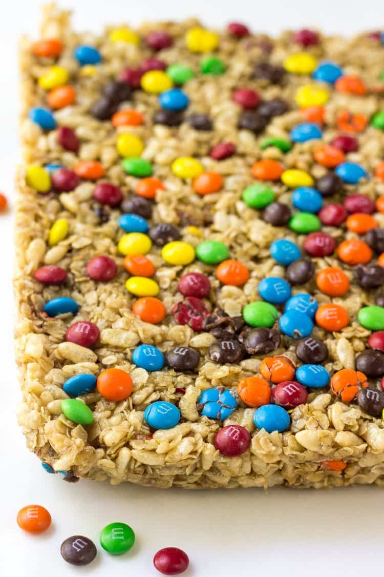 These homemade chewy M&M granola bars are the perfect after school snack. No bake, soft & chewy, and filled with M&Ms! Easy no bake summer dessert recipes you'll want to try.