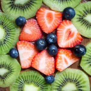 Chocolate fruit pizza is always a total crowd pleaser. With chewy sugar cookie, creamy chocolate cream cheese topping & fresh berries - you can't go wrong!