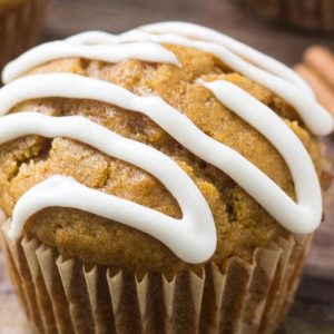 These pumpkin muffins with cream cheese glaze are moist, fluffy & filled with fall flavors. The perfect breakfast for fall!