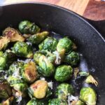 Permalink to: Balsamic and Maple Roasted Brussels Sprouts cast iron pan with brussels sprouts