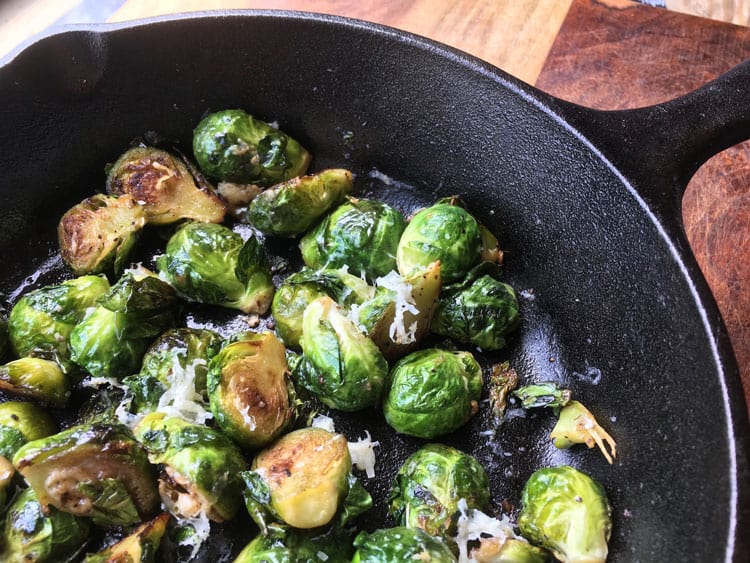 cast iron pan with brussels sprouts