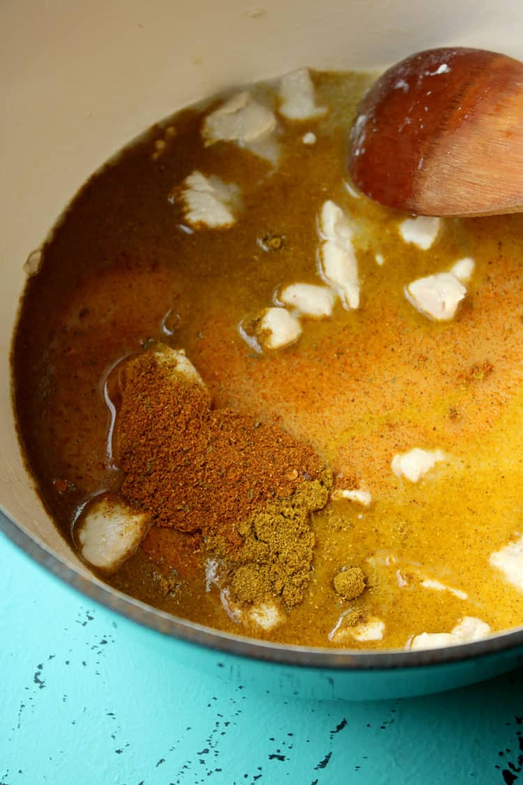 making chicken curry on stove top