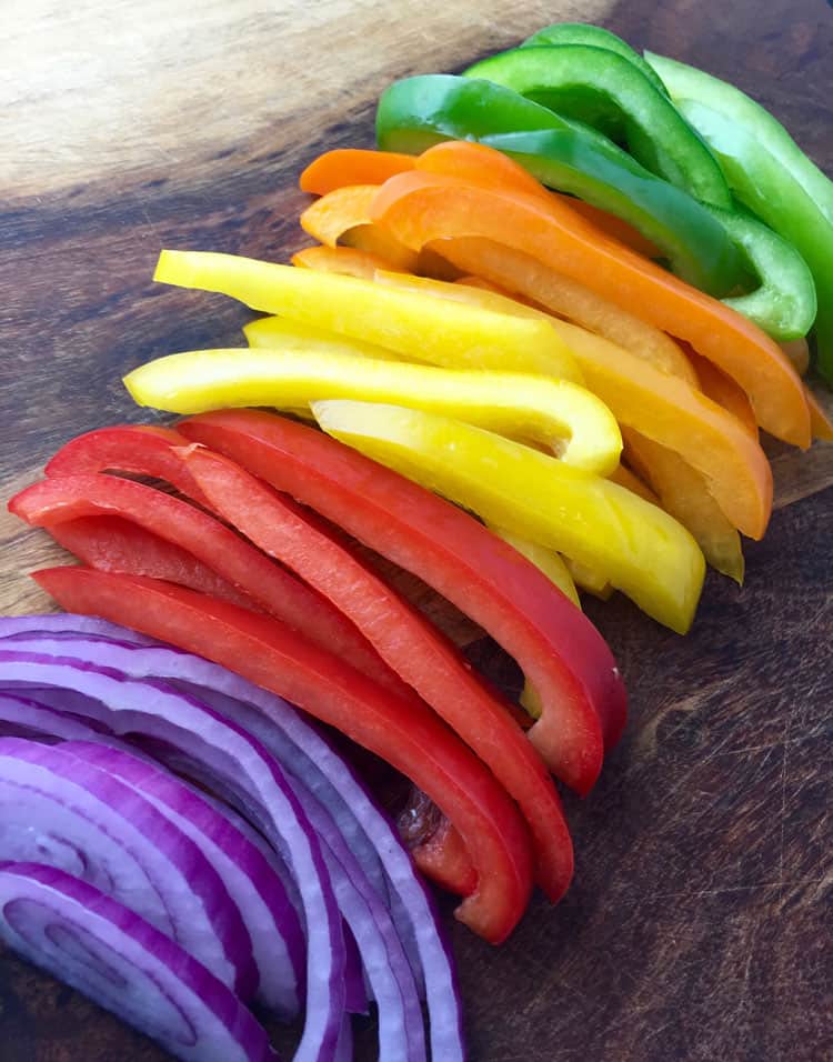 sliced peppers and onions for fajitas