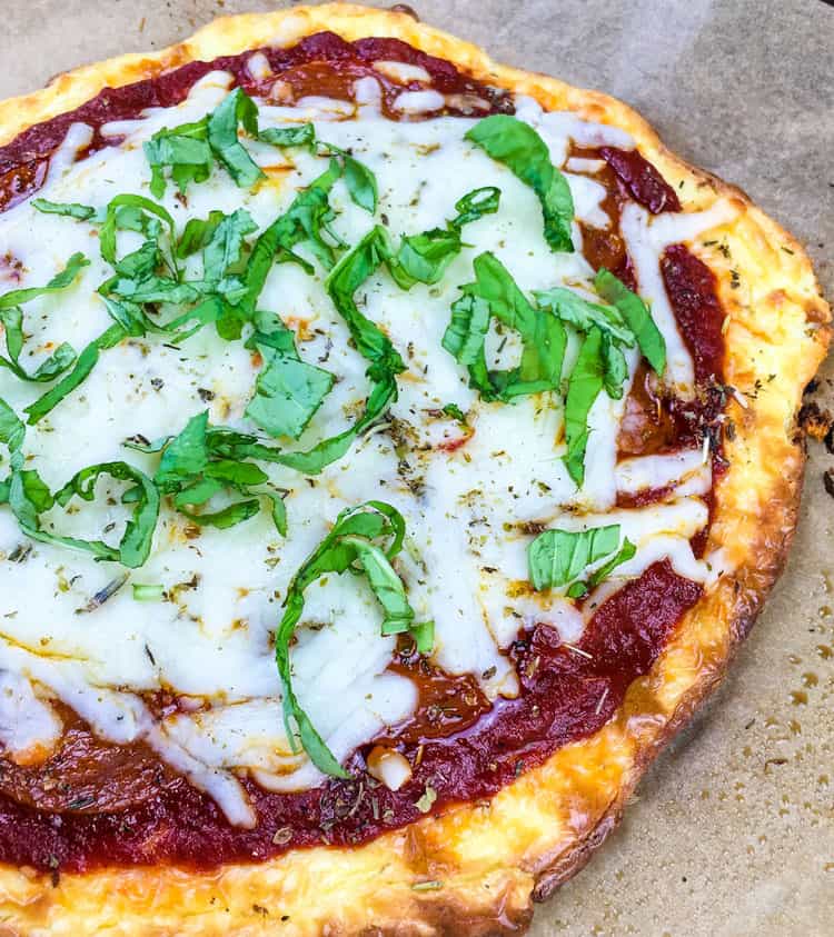 cheese and pepperoni pizza on countertop