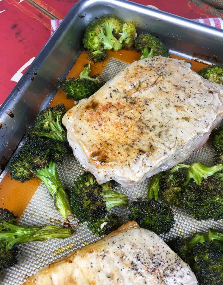 broccoli and pork chops in roasting pan