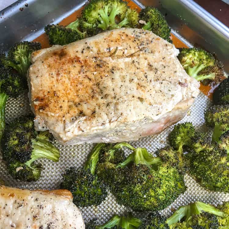 pork chops and broccoli in roasting pan