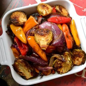 Mediterranean roasted vegetables in white square pan
