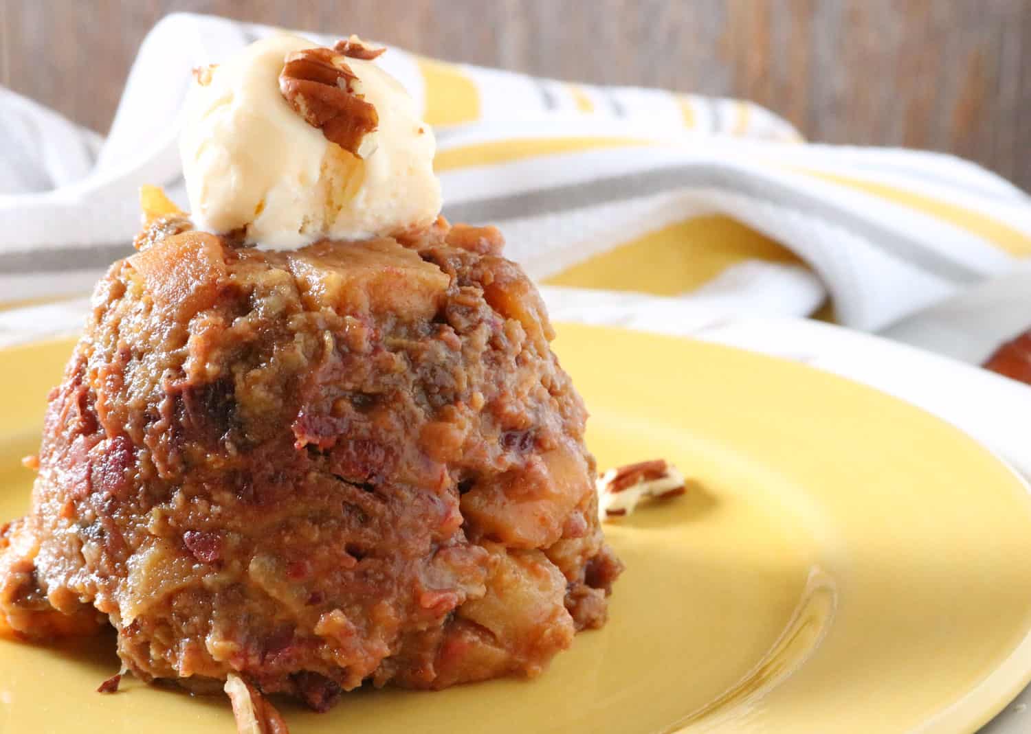 Easy Slow Cooker Bread Pudding recipe with vanilla ice cream on top