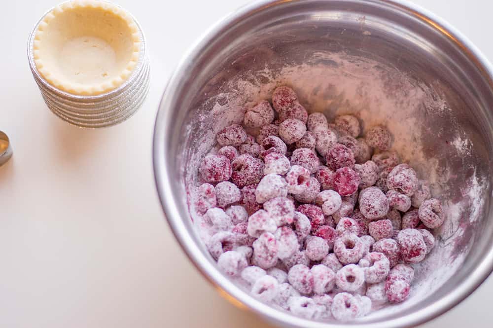 Frozen raspberries combined with sugar, cornstarch and lemon juice