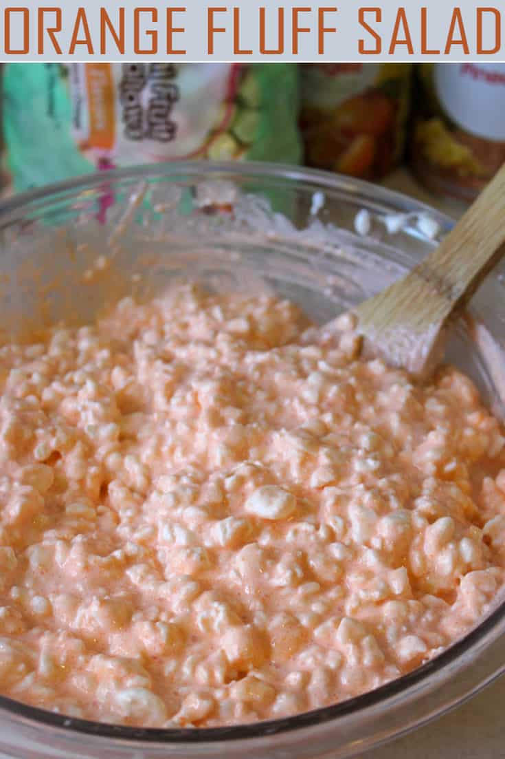 Looking for a simple dish for your next potluck? Try Orange Fluff Salad! It's a delicious crowd-pleaser your friends and family will love! #orangefluffsalad #fluffsalad #potluckrecipes