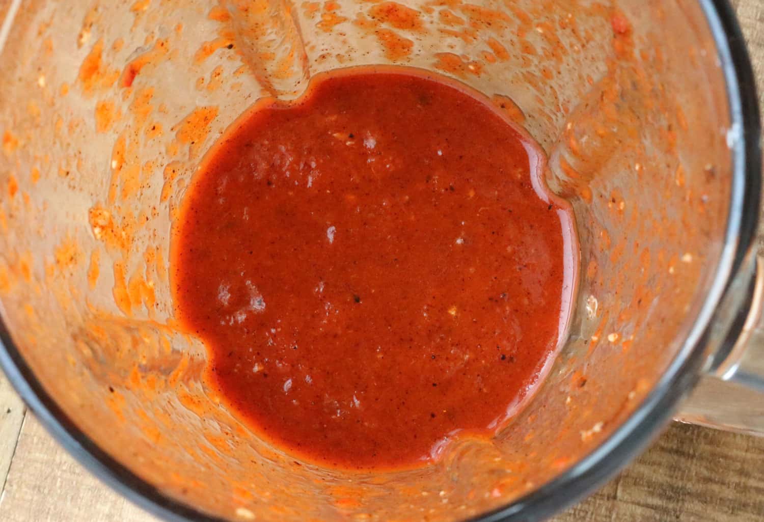 food processor pitcher with pureed roasted red pepper dip