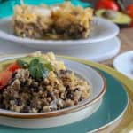 Permalink to: Instant Pot Southwest Breakfast Bake — Delicious Instant Pot Breakfast Casserole Southwest Style A serving of Instant Po Southwest Breakfast Bake in a white plate with blue and yellow charger