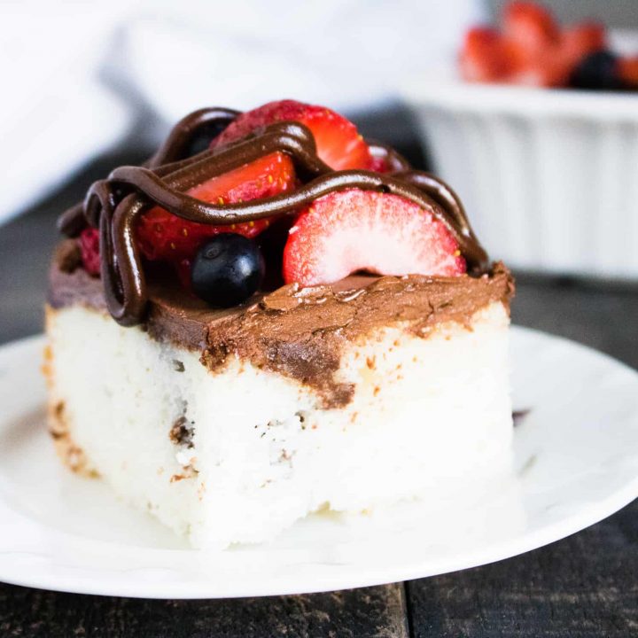 Chocolate Ganache Poke Cake with Berries