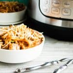Permalink to: Instant Pot Baked Spaghetti Instant Pot Baked Spaghetti served in a white bowl next to two silver forks