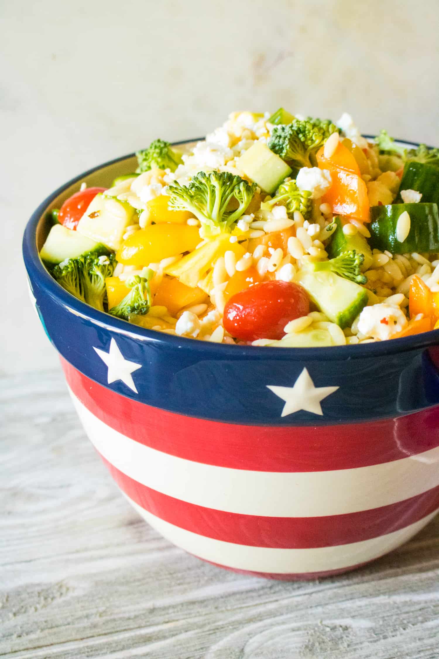 Summer Orzo Salad mixed and ready to serve in a bowl