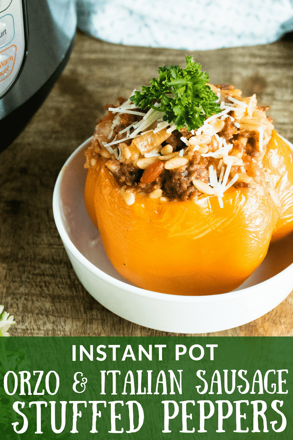 You will just LOVE this Instant Pot Orzo & Italian Sausage Easy Stuffed Peppers recipe! With orange and yellow peppers filled with Italian sausage and orzo, this recipe is amazingly delicious and pretty to look at! And thanks to the Instant Pot, it cooks in a jiffy! It's the perfect dinner for those busy weeknights. #instantpotstuffedpeppers #easystuffedpeppers #quickstuffedpeppers #quickweeknightmeal #stuffedpeppers #instantpot #italiansausage