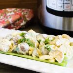 Permalink to: Instant Pot Heirloom Potato Salad Instant Pot Heirloom Potato Salad on a bed of lettuce served on a white platter