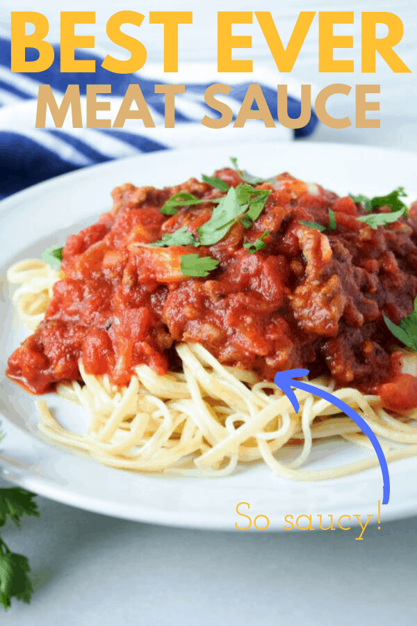 meaty pasta sauce with noodles on white plate