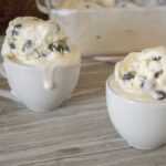Permalink to: Blueberry Lemon No-Churn Homemade Ice Cream two servings of blueberry lemon no-churn homemade ice cream served in white ceramic mugs