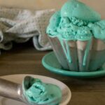 No-Churn Blue Moon Ice Cream served in a silver ice cream dish
