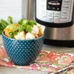 Permalink to: Instant Pot Easy Fish Tacos Instant Pot Cod fillets served in a blue polka dot bowl and garnished with parsley