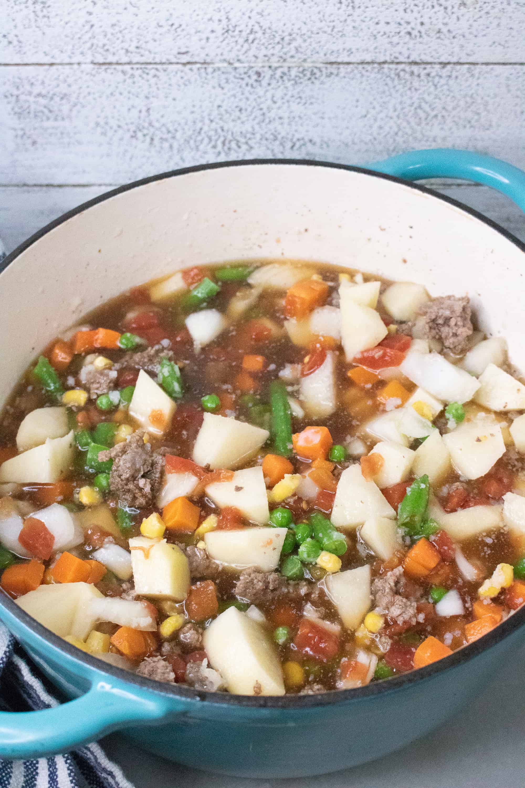 poor man's soup in blue stock pot