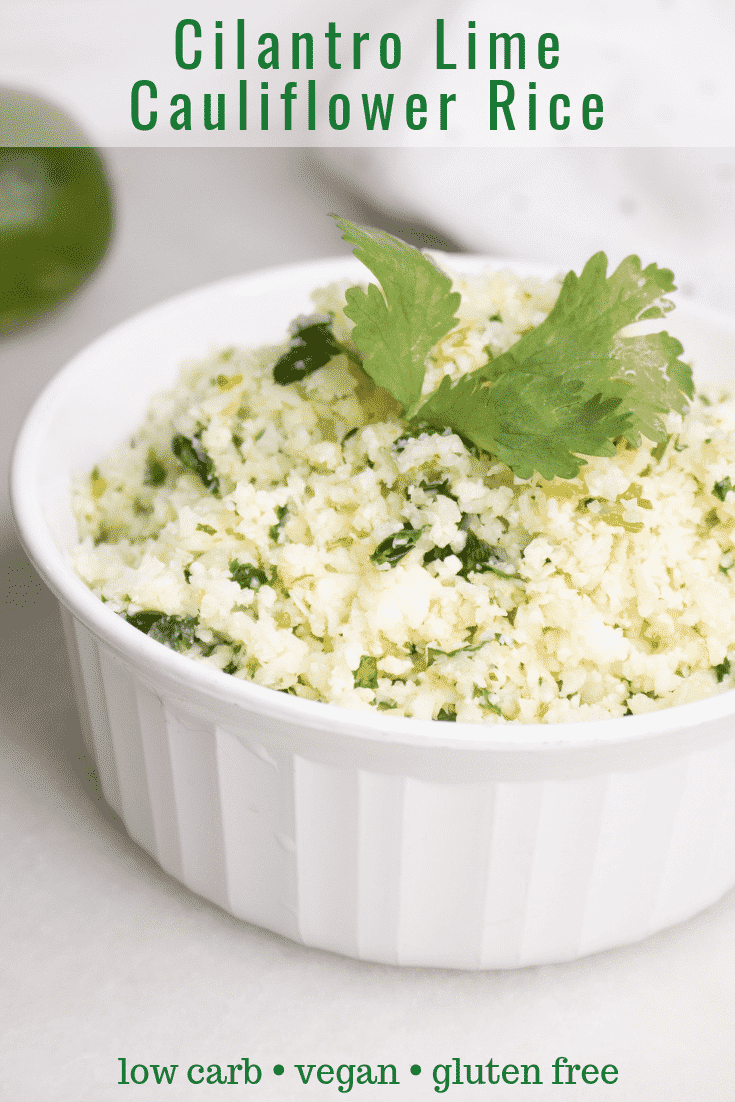 close up of cilantro lime cauliflower rice in a white serving dish