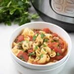 Permalink to: Poor Man's Beefy Tomato Macaroni Instant Pot Soup Instant Pot Poor Man's Beefy Tomato Macaroni Soup served in a white bowl set in front of the instant pot