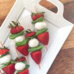 Permalink to: Strawberry Caprese Skewers with Balsamic Glaze strawberry caprese skewers on a white platter