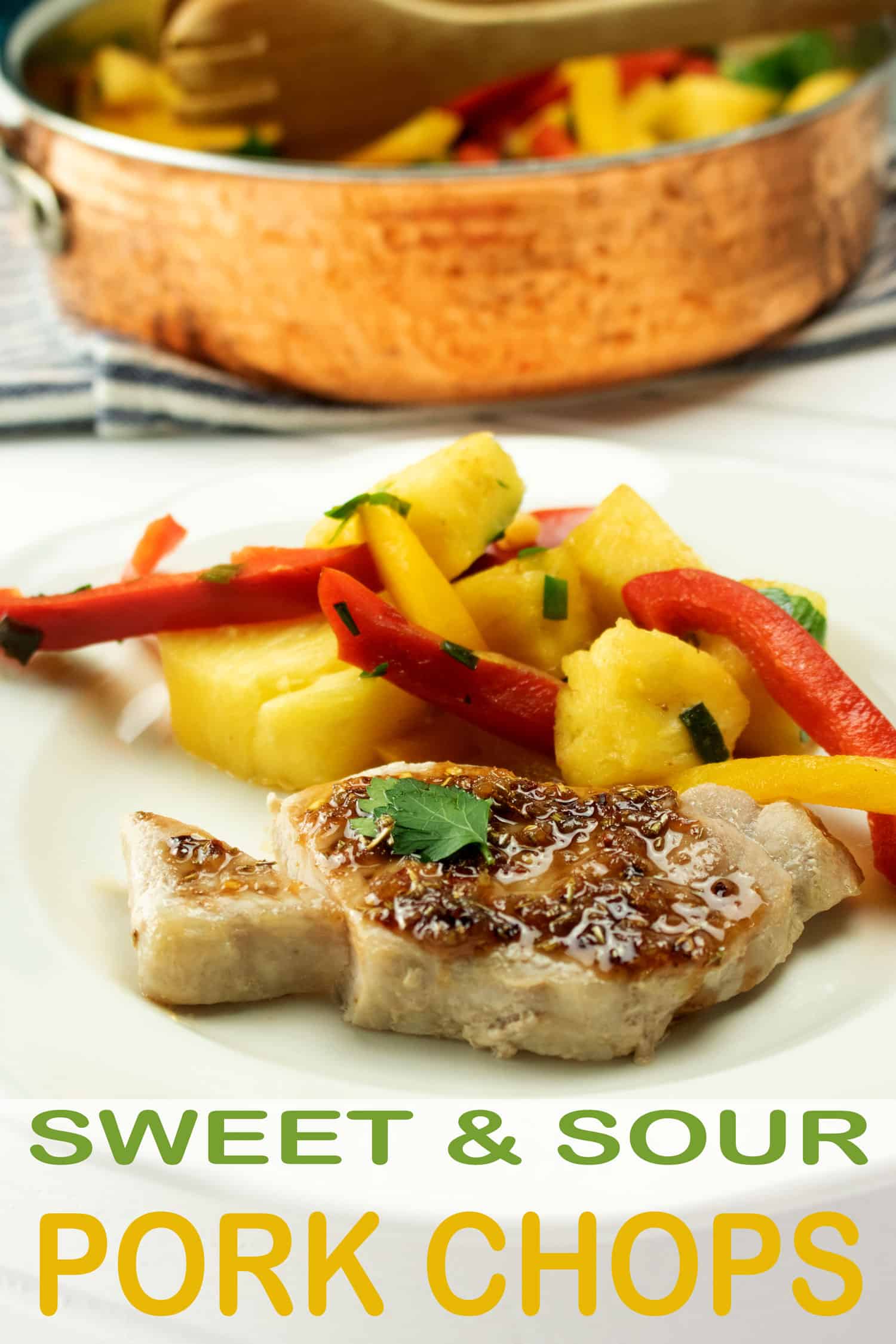 healthy pork chops recipe with vegetables on white plate