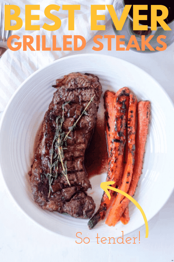 steak and carrots on white plate