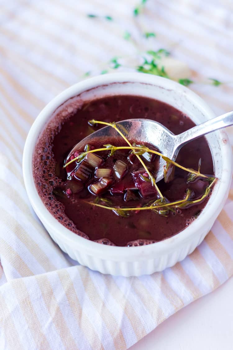 red wine steak sauce in a bowl with a spoon 