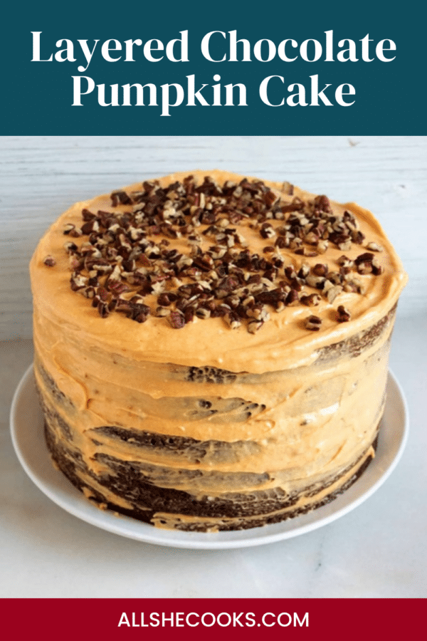 Layered Chocolate Pumpkin Cake Pinterest pin showing the whole frosted cake topped with pecans