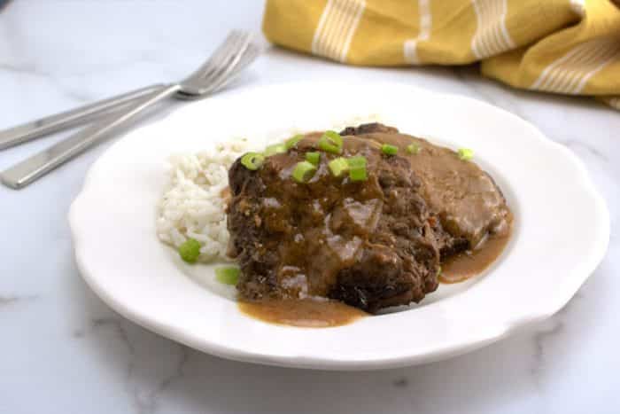 Salisbury Steak on plate with rice