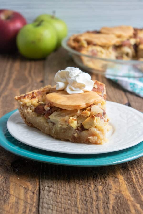 slice of apple pie on white plate