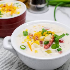 corn chowder in white bowl