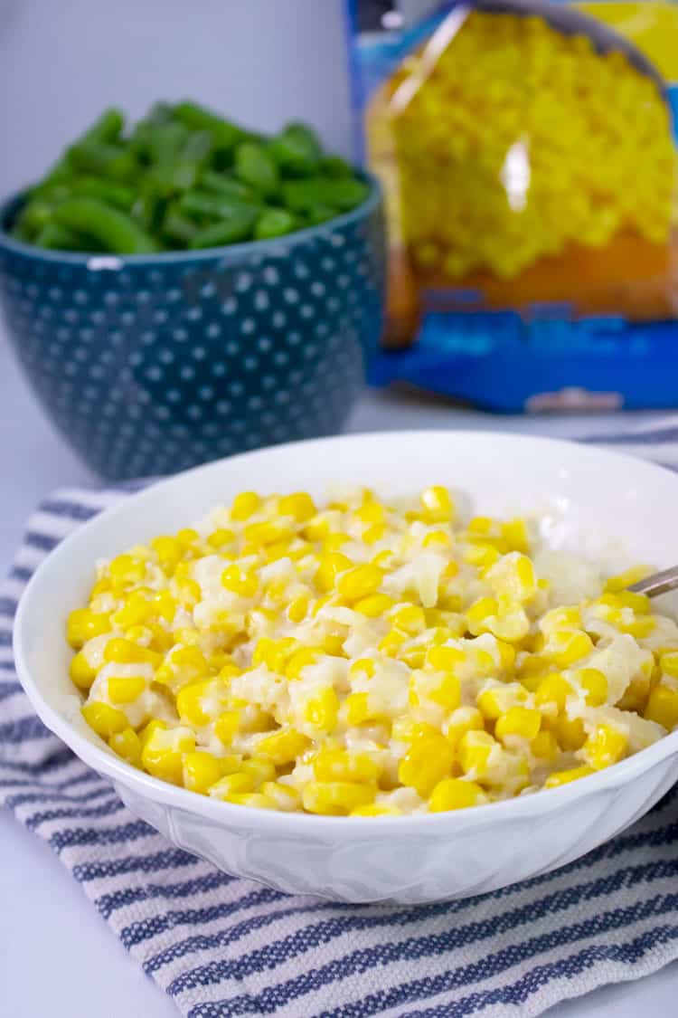 creamed frozen corn in a white bowl