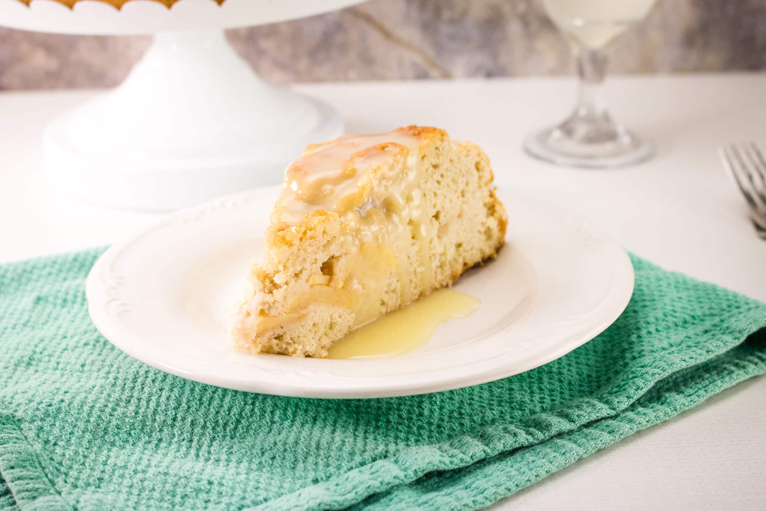 homemade apple cake on white plate