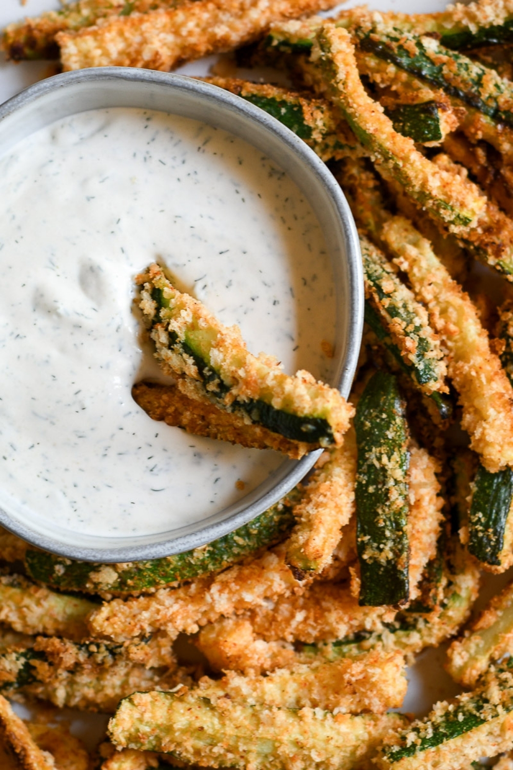 Oven Baked Zucchini Fries being served with dipping sauce
