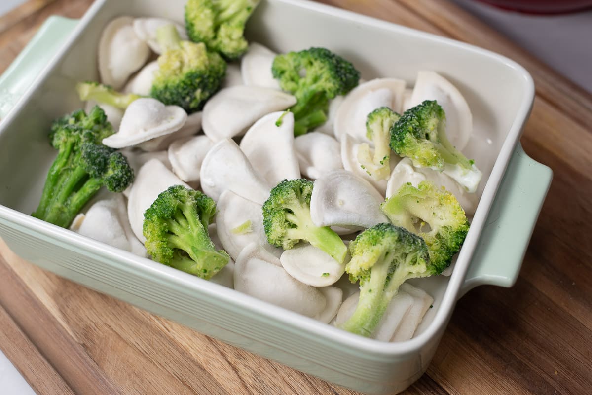 broccoli and pierogies in a baking dish