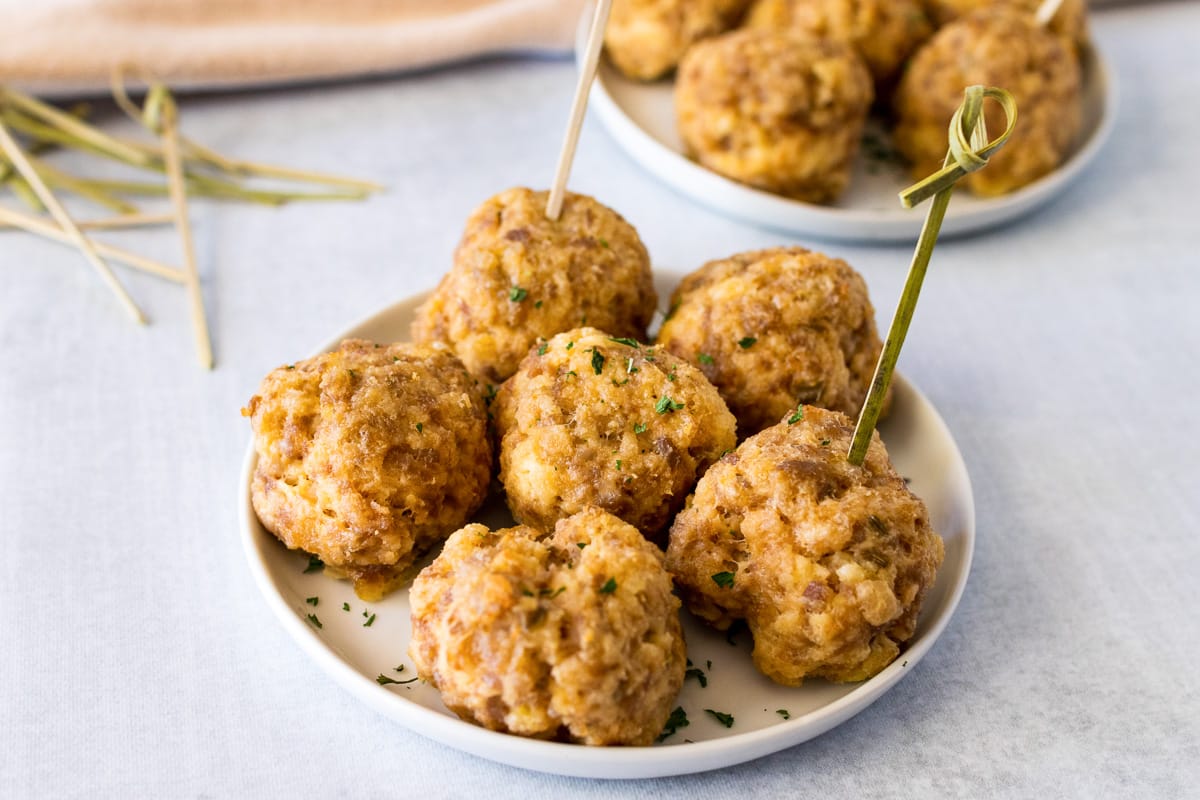 plate of cream cheese sausage balls with toothpicks