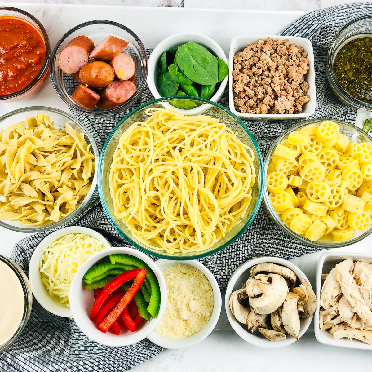 closer top view of bowls of components for diy pasta bar