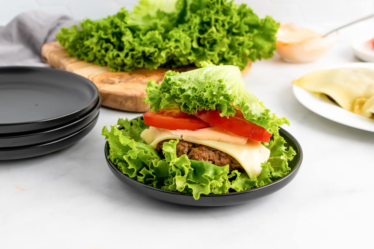 assembled lettuce wrap burger on a plate