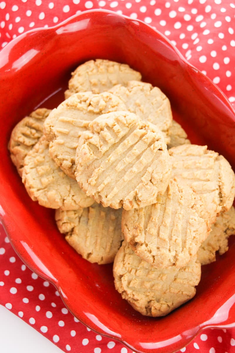 red plate full of old-fashioned peanut butter cookies