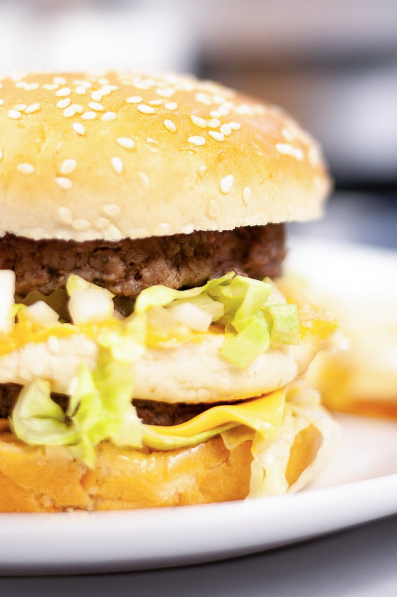 closeup copycat big Mac on white plate