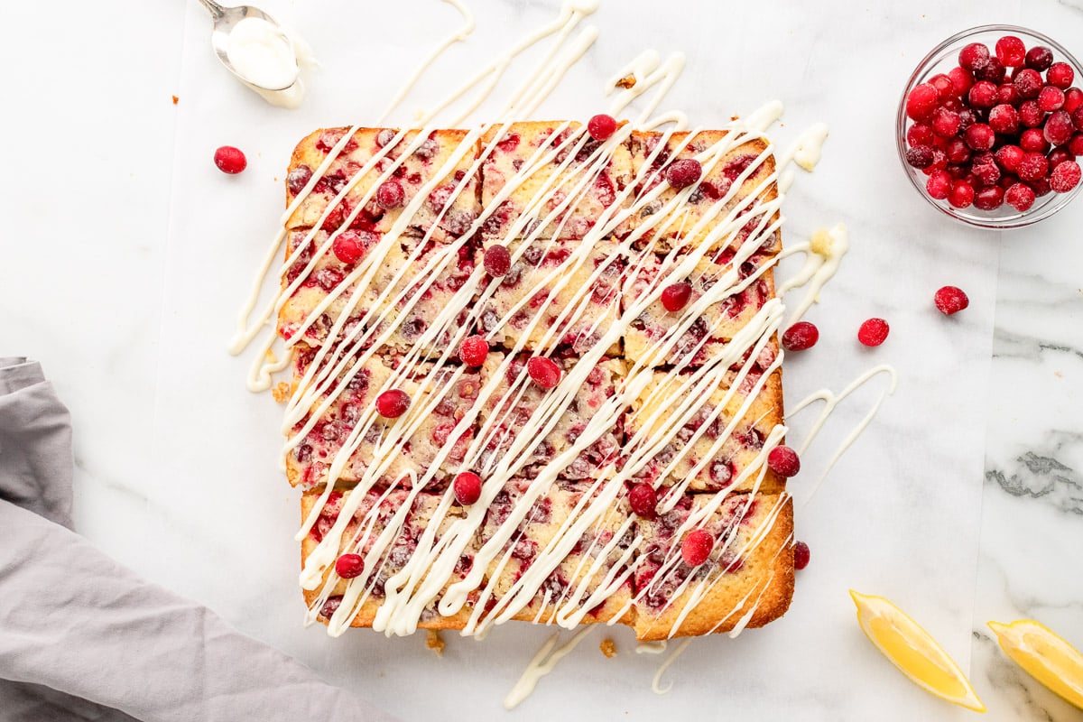 cranberry lemon bars drizzled with icing