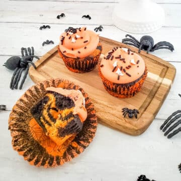 tie-dye inspired orange and black cupcake