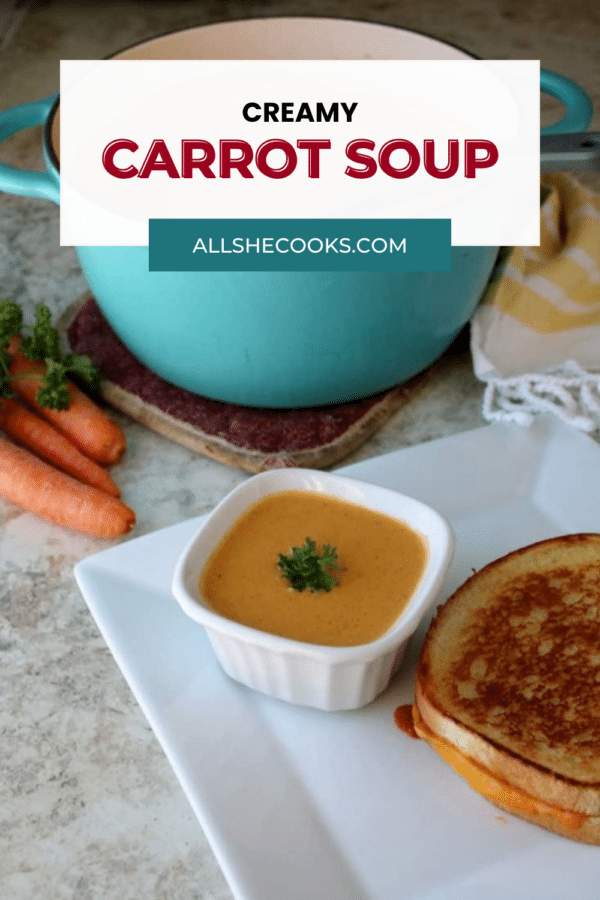 Creamy carrot soup Pinterest graphic with a ramekin of soup beside grilled cheese