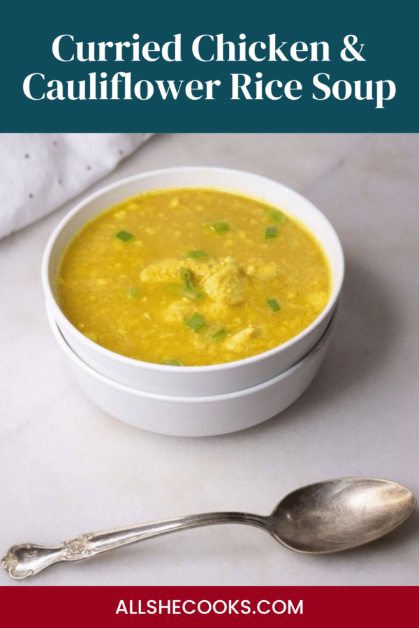 Curried chicken and cauliflower rice soup in a white bowl with a spoon, Pinterest graphic